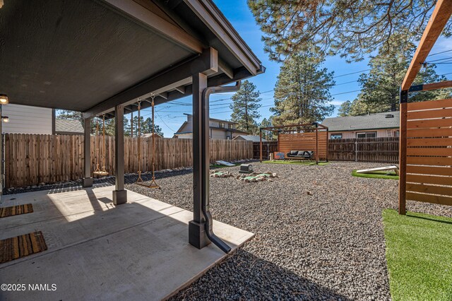 3580 Huron, Flagstaff, AZ 86005 - view of yard with a fenced backyard and a patio area