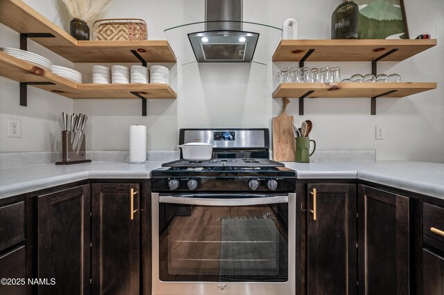 3580 Huron, Flagstaff, AZ 86005 - kitchen with open shelves, dark brown cabinetry, stainless steel gas range, and light countertops