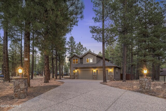 view of front of home with a garage