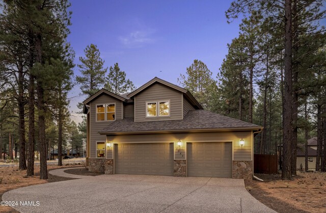 view of front of property featuring a garage