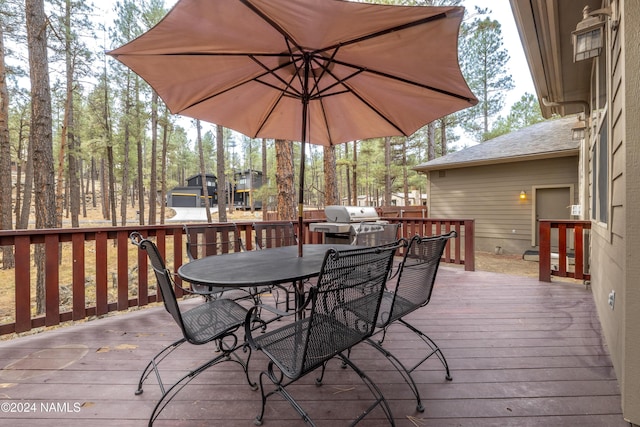 wooden terrace with grilling area