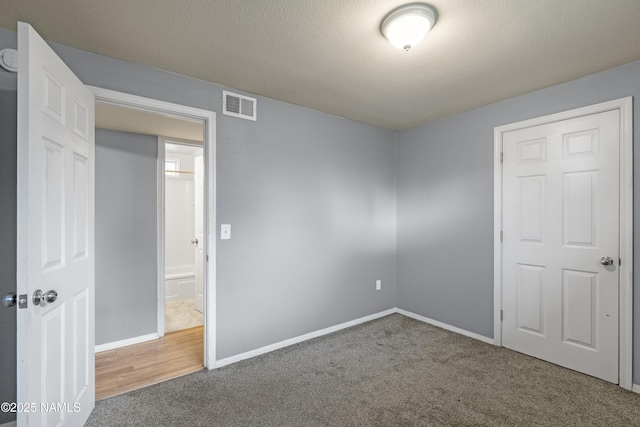 3580 N Jamison Blvd, Flagstaff, AZ 86004 - unfurnished bedroom with carpet flooring and baseboards