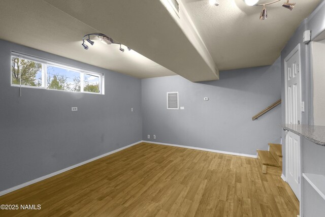 3580 N Jamison Blvd, Flagstaff, AZ 86004 - basement with light wood finished floors and baseboards