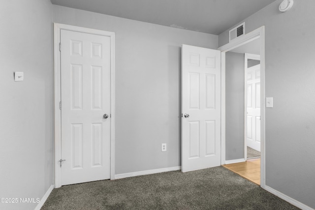 3580 N Jamison Blvd, Flagstaff, AZ 86004 - unfurnished bedroom with carpet floors and baseboards