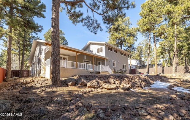 2476 S Cliffview St, Flagstaff, AZ 86001 - view of front of house with covered porch and fence