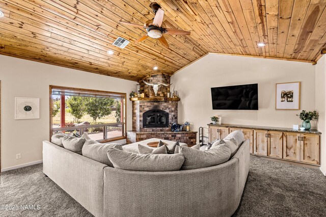 7507 Deville Ln, Flagstaff, AZ 86004 - living area featuring carpet floors, wooden ceiling, a large fireplace, a ceiling fan, and vaulted ceiling