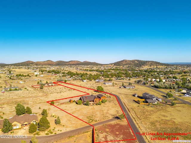 7507 Deville Ln, Flagstaff, AZ 86004 - aerial overview of property's location featuring mountains and property parcel outlined