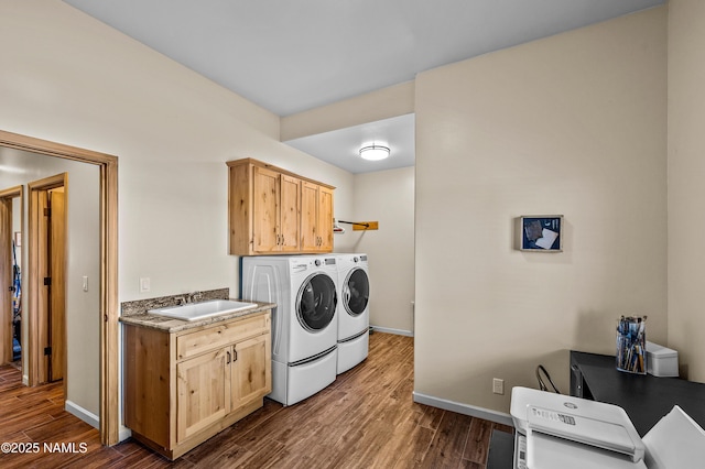 7507 Deville Ln, Flagstaff, AZ 86004 - laundry room featuring independent washer and dryer, dark wood-type flooring, and cabinet space