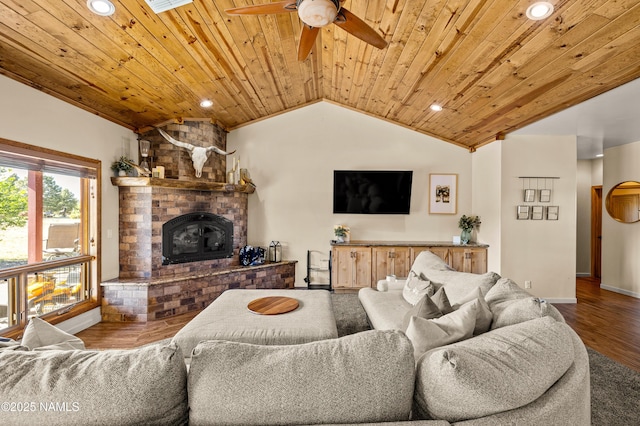7507 Deville Ln, Flagstaff, AZ 86004 - living area with wooden ceiling, lofted ceiling, recessed lighting, a ceiling fan, and a fireplace