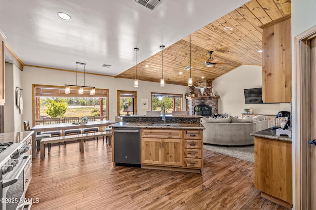 7507 Deville Ln, Flagstaff, AZ 86004 - kitchen featuring dishwasher, stove, a fireplace, open floor plan, and wooden ceiling