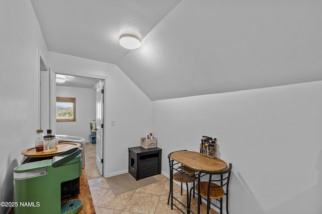 7507 Deville Ln, Flagstaff, AZ 86004 - bathroom featuring vaulted ceiling and tile patterned flooring