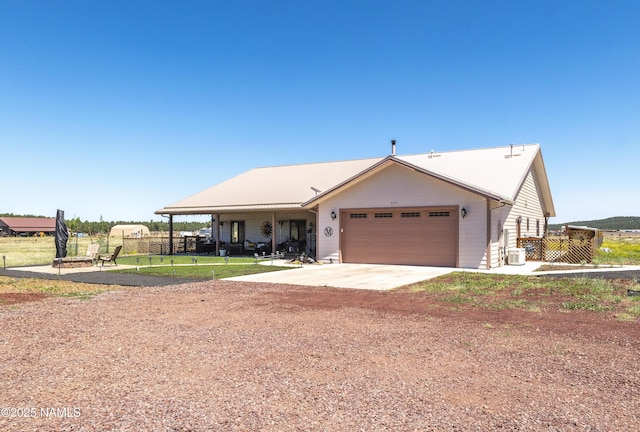 3095 E Pinetree Dr, Williams, AZ 86046 - view of front of property featuring driveway and a garage