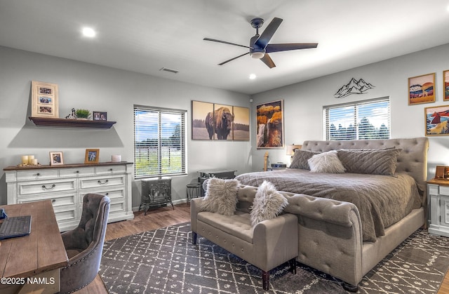 3095 E Pinetree Dr, Williams, AZ 86046 - bedroom featuring multiple windows, wood finished floors, recessed lighting, and a ceiling fan