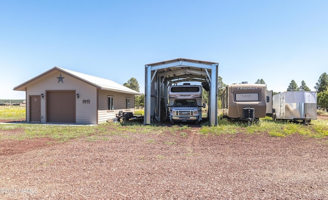 3095 E Pinetree Dr, Williams, AZ 86046 - view of outdoor structure with a detached carport