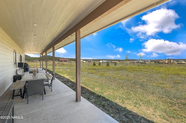 3095 E Pinetree Dr, Williams, AZ 86046 - view of patio with outdoor dining space, a rural view, and area for grilling