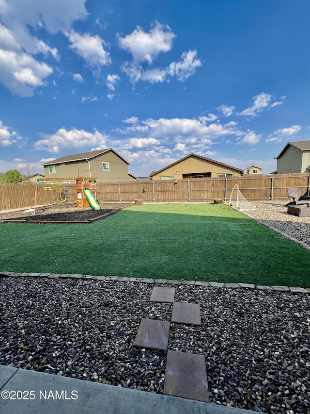 view of yard with a playground