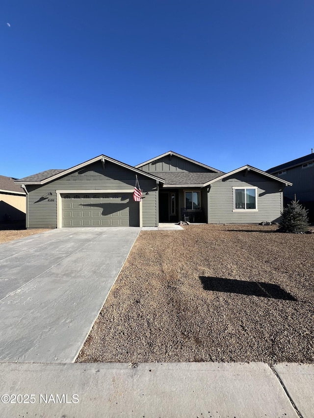 ranch-style home featuring a garage