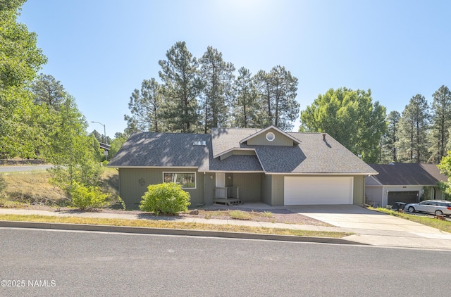 1470 W Melissa Dr, Flagstaff, AZ 86005 - ranch-style home featuring a garage, driveway, and roof with shingles