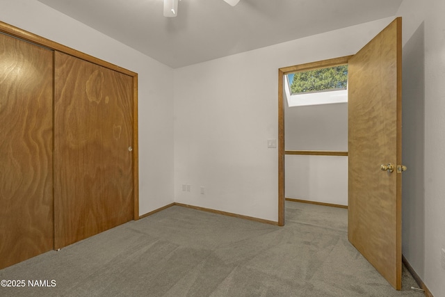 1470 W Melissa Dr, Flagstaff, AZ 86005 - unfurnished bedroom featuring carpet floors, a closet, and a ceiling fan
