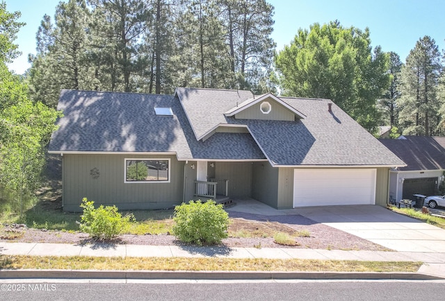 1470 W Melissa Dr, Flagstaff, AZ 86005 - view of front of home featuring a shingled roof, a garage, and concrete driveway