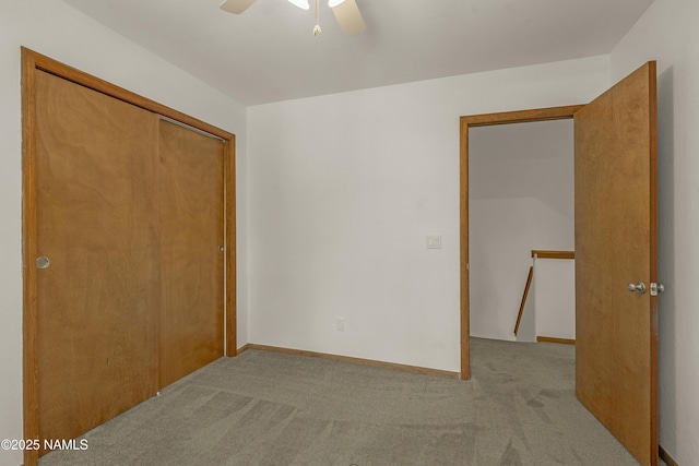 1470 W Melissa Dr, Flagstaff, AZ 86005 - unfurnished bedroom with carpet flooring, a closet, and a ceiling fan