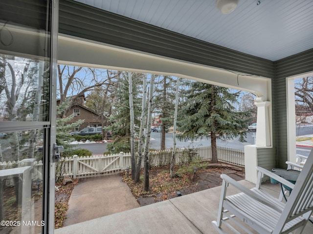 view of patio / terrace with fence and a gate