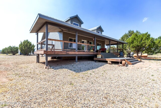 view of front of house with a wooden deck