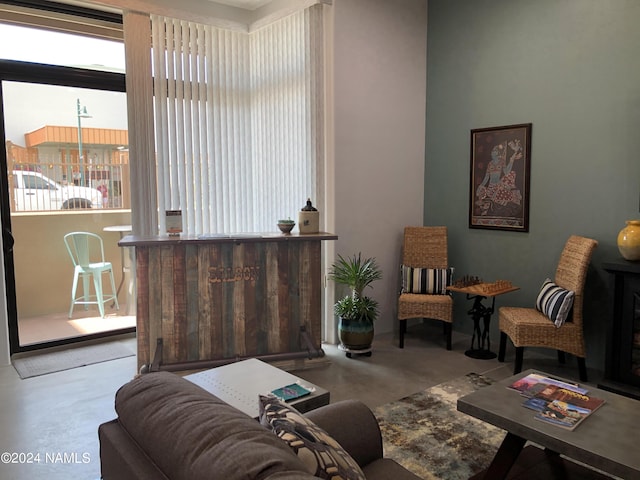 living room with concrete flooring