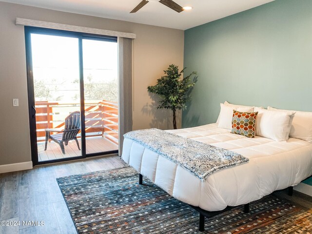 bedroom featuring ceiling fan, access to exterior, and hardwood / wood-style floors