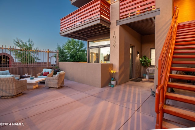 view of patio / terrace featuring a balcony and outdoor lounge area