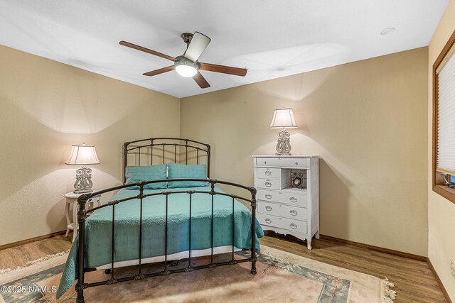 2303 N Plateau Dr, Flagstaff, AZ 86004 - bedroom featuring wood finished floors and ceiling fan