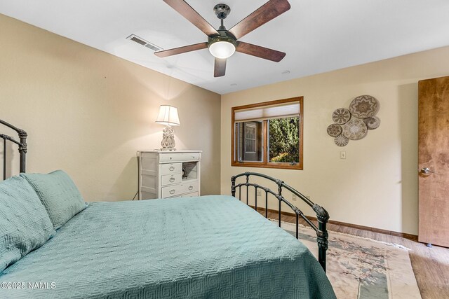 2303 N Plateau Dr, Flagstaff, AZ 86004 - bedroom with wood finished floors and ceiling fan