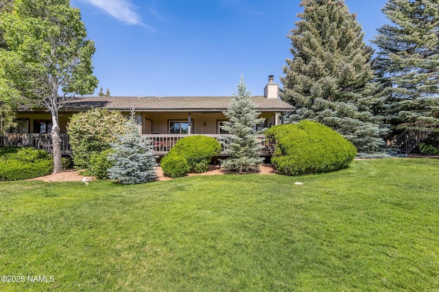 2303 N Plateau Dr, Flagstaff, AZ 86004 - view of front of property featuring a chimney and a front yard
