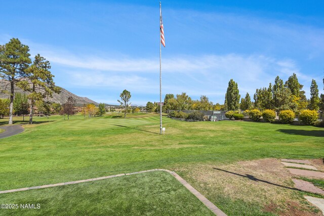 2303 N Plateau Dr, Flagstaff, AZ 86004 - view of community featuring a mountain view, a yard, and golf course view