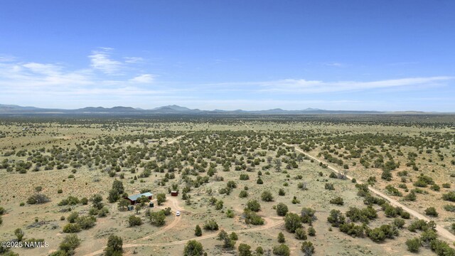 89 N Wyandotte Rd, Williams, AZ 86046 - aerial view of sparsely populated area with a desert landscape and a mountain backdrop