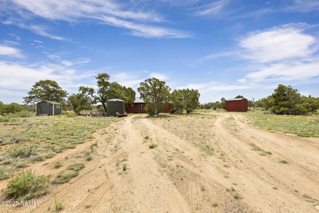 89 N Wyandotte Rd, Williams, AZ 86046 - view of dirt / gravel driveway featuring a view of countryside