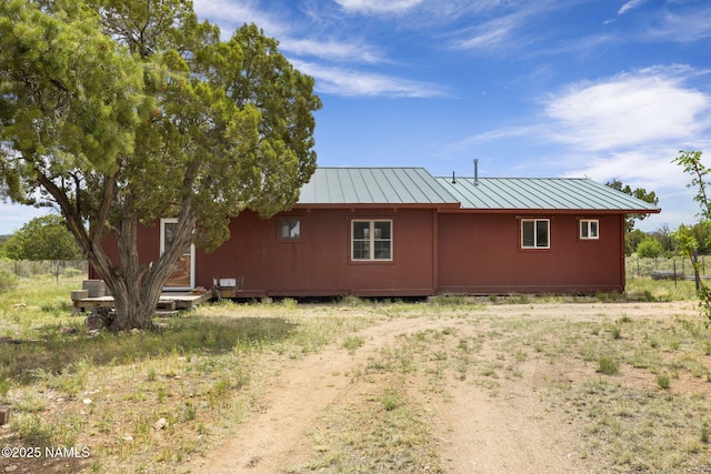 89 N Wyandotte Rd, Williams, AZ 86046 - view of home's exterior featuring metal roof and a standing seam roof