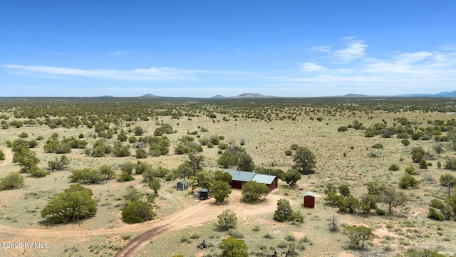 89 N Wyandotte Rd, Williams, AZ 86046 - view of rural area featuring a desert landscape and a mountain backdrop