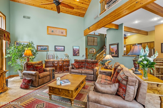 2300 W Kiltie Ln, Flagstaff, AZ 86005 - living room with a ceiling fan, a high ceiling, beam ceiling, recessed lighting, and stairs