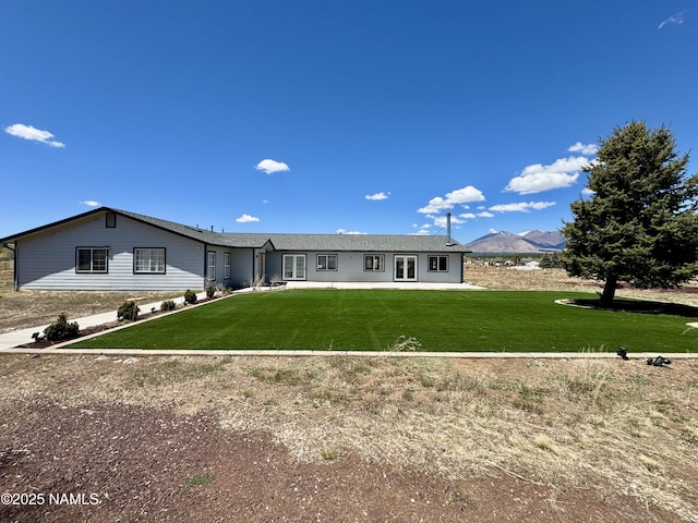 7840 Cowboy Way, Flagstaff, AZ 86004 - rear view of house with a yard