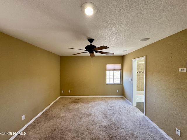 7840 Cowboy Way, Flagstaff, AZ 86004 - carpeted empty room with ceiling fan, a textured ceiling, a textured wall, and baseboards