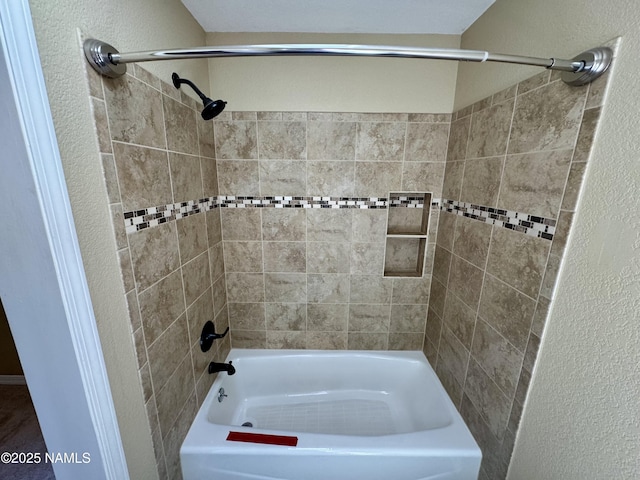 7840 Cowboy Way, Flagstaff, AZ 86004 - full bath featuring a textured wall and shower / tub combination