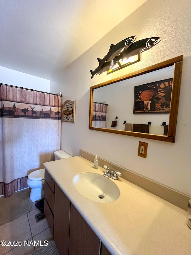 3153 Pinetree Dr, Williams, AZ 86046 - bathroom featuring vanity, toilet, a shower with curtain, and tile patterned floors