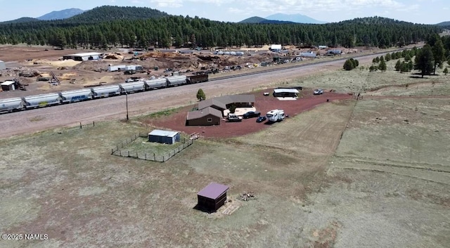 3153 Pinetree Dr, Williams, AZ 86046 - drone / aerial view of a forest and a mountain backdrop