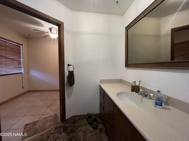 3153 Pinetree Dr, Williams, AZ 86046 - bathroom with vanity, ceiling fan, tile patterned flooring, and baseboards