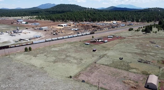 3153 Pinetree Dr, Williams, AZ 86046 - aerial view of a mountainous background and a heavily wooded area