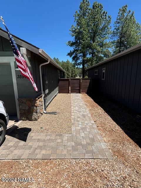 view of property exterior featuring a garage