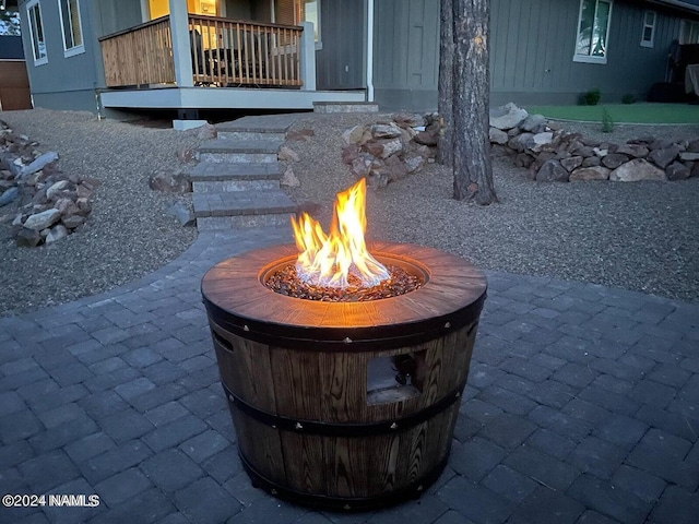 view of patio featuring a fire pit