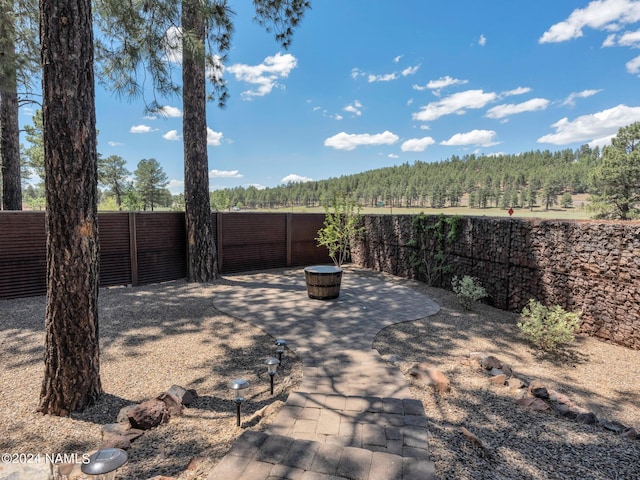 view of patio / terrace with an outdoor fire pit