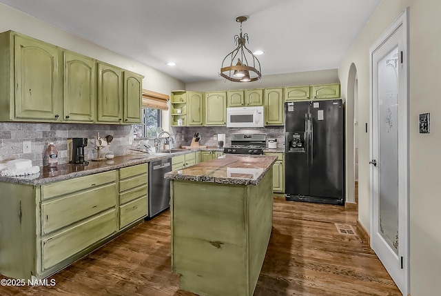 1384 W Canvasback Trl, Williams, AZ 86046 - kitchen with stainless steel appliances, green cabinets, backsplash, dark wood-type flooring, and recessed lighting